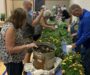 Folks learn about gardening and seeds